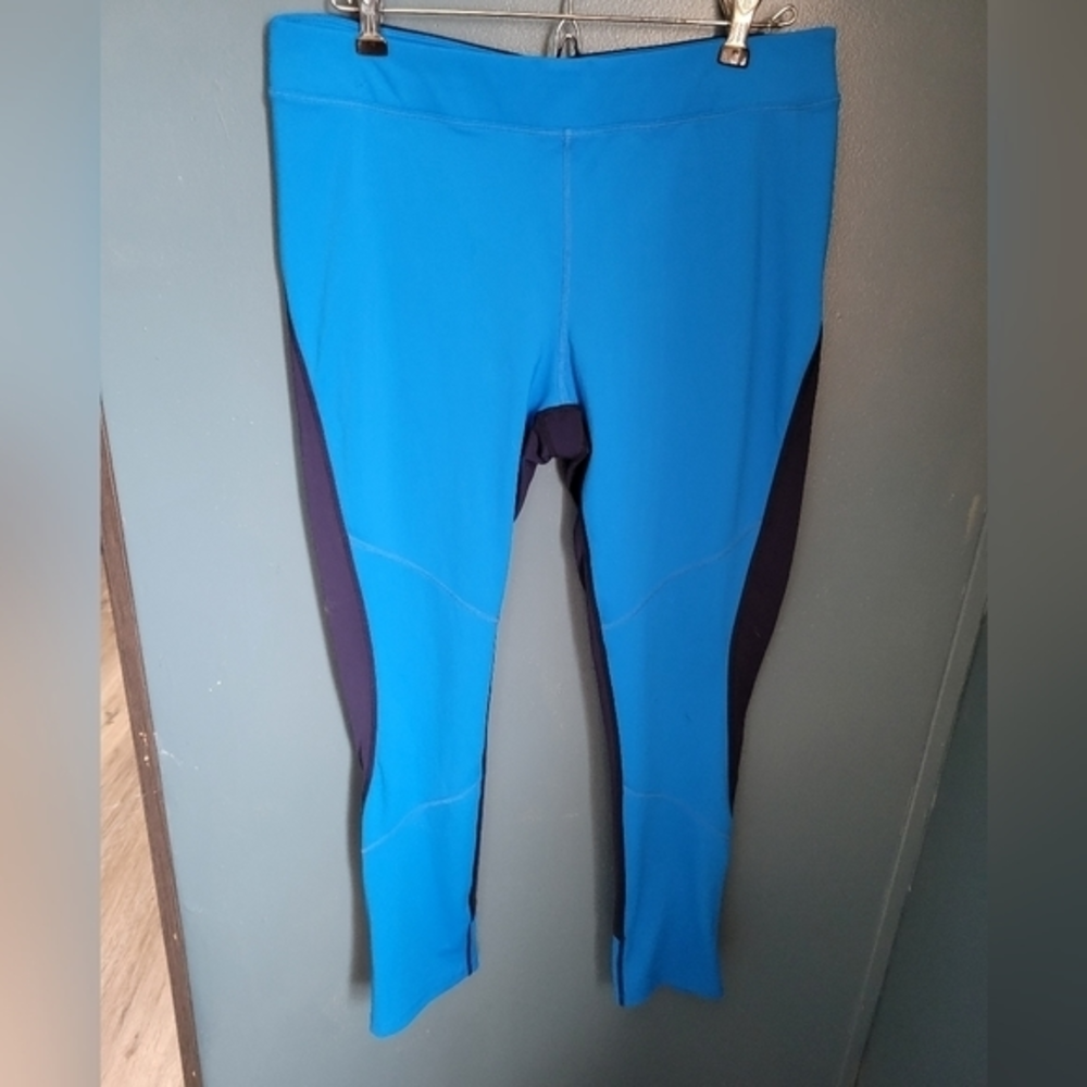 Athleta size Large‎ blue leggings with zippered ankles